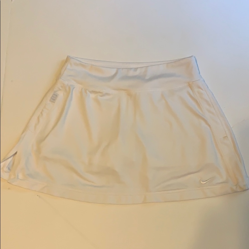 White Nike tennis Skirt with built in shorts. XS